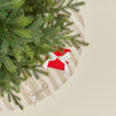 Overhead view of Essential Striped Tree Skirt - Ivory/Flax with tree