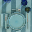 Placesetting on Essential Striped Tablecloth in Sky and Peacock.