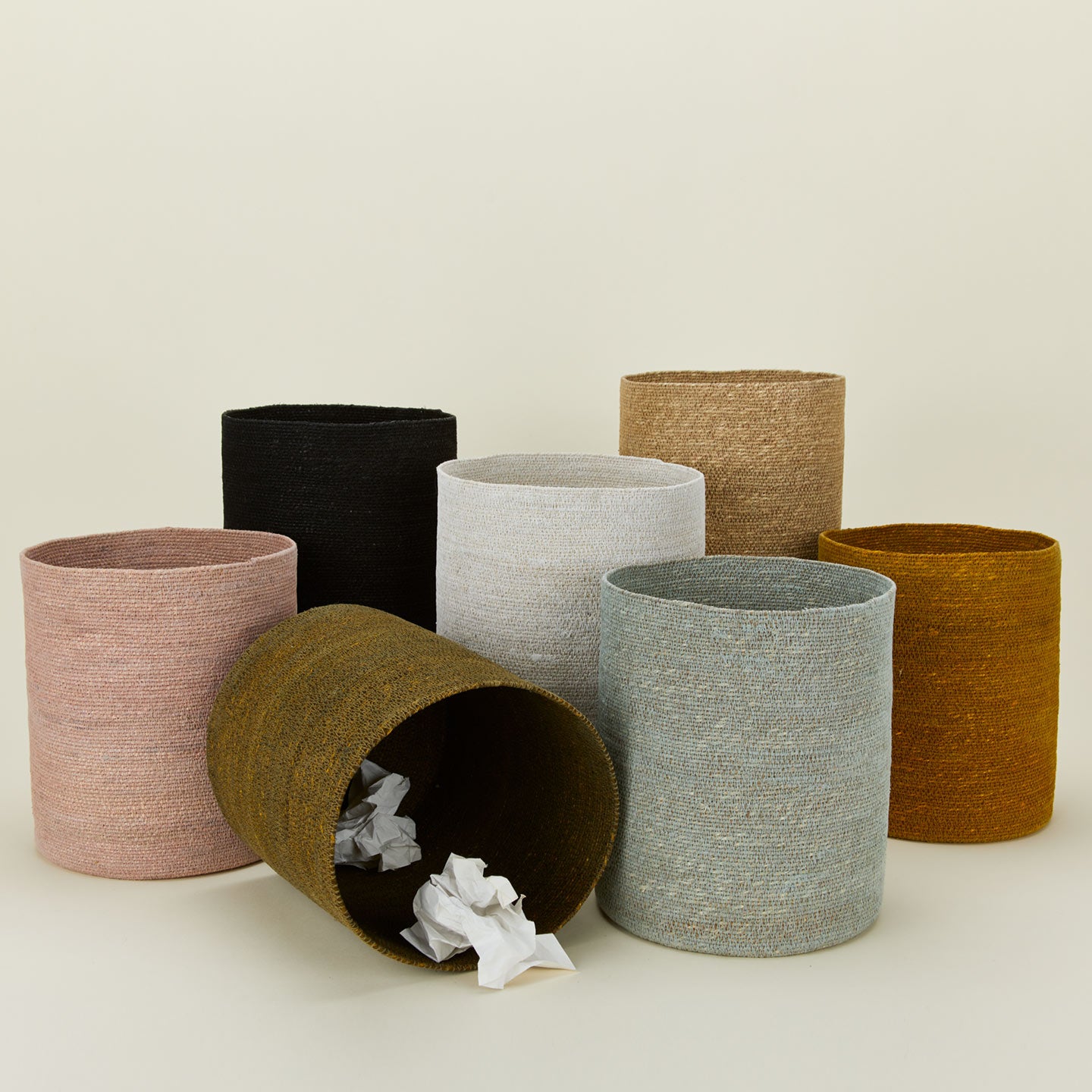 Essential woven waste basket in various colors