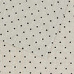 Detailed view of black linen dot placemat