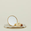 Round brass mirror.