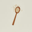 Teak serving spoon with oatmeal