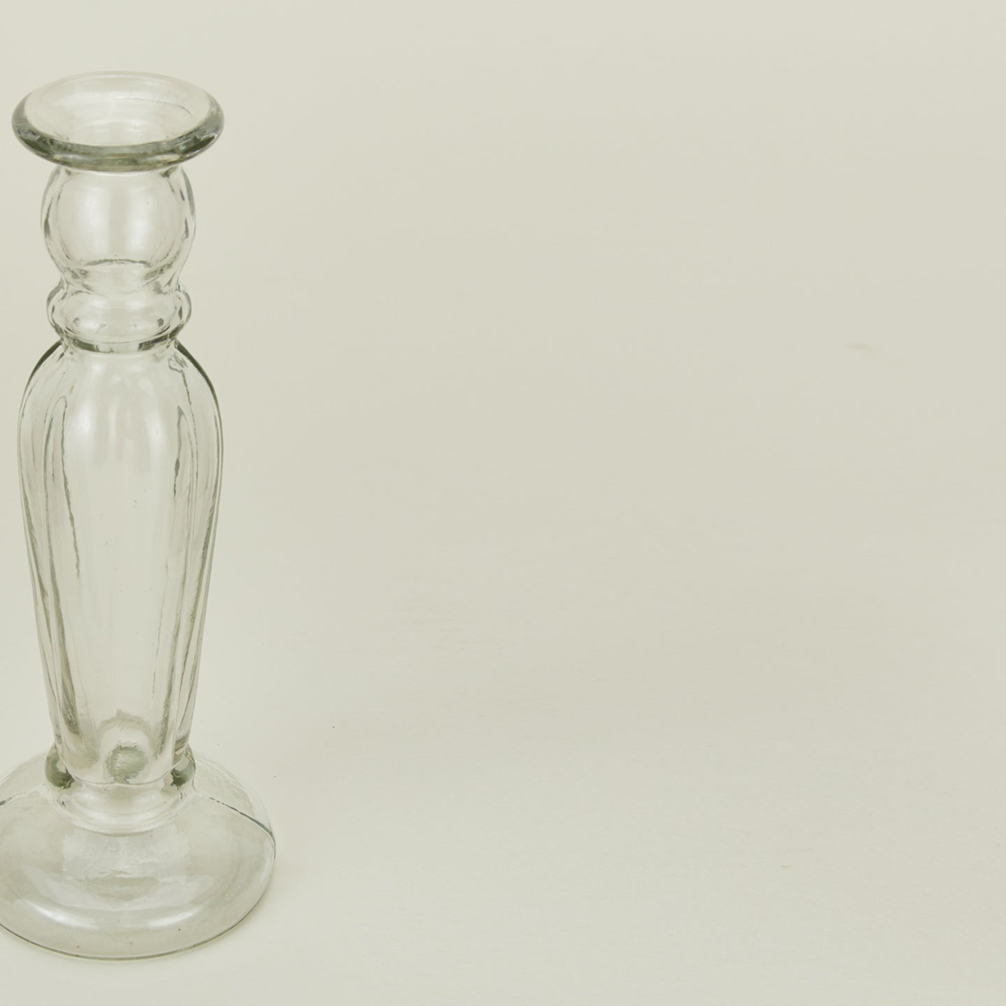 Close up view of large blown candlestick holder