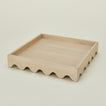 Detailed view of Square scallop tray