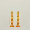 Disk candle holder in amber