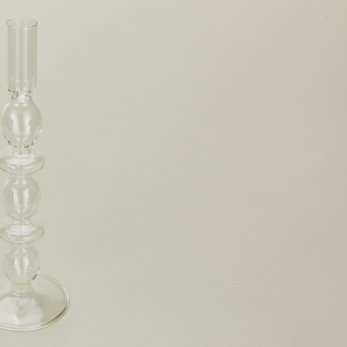 Close up view of Disk candle holder in clear