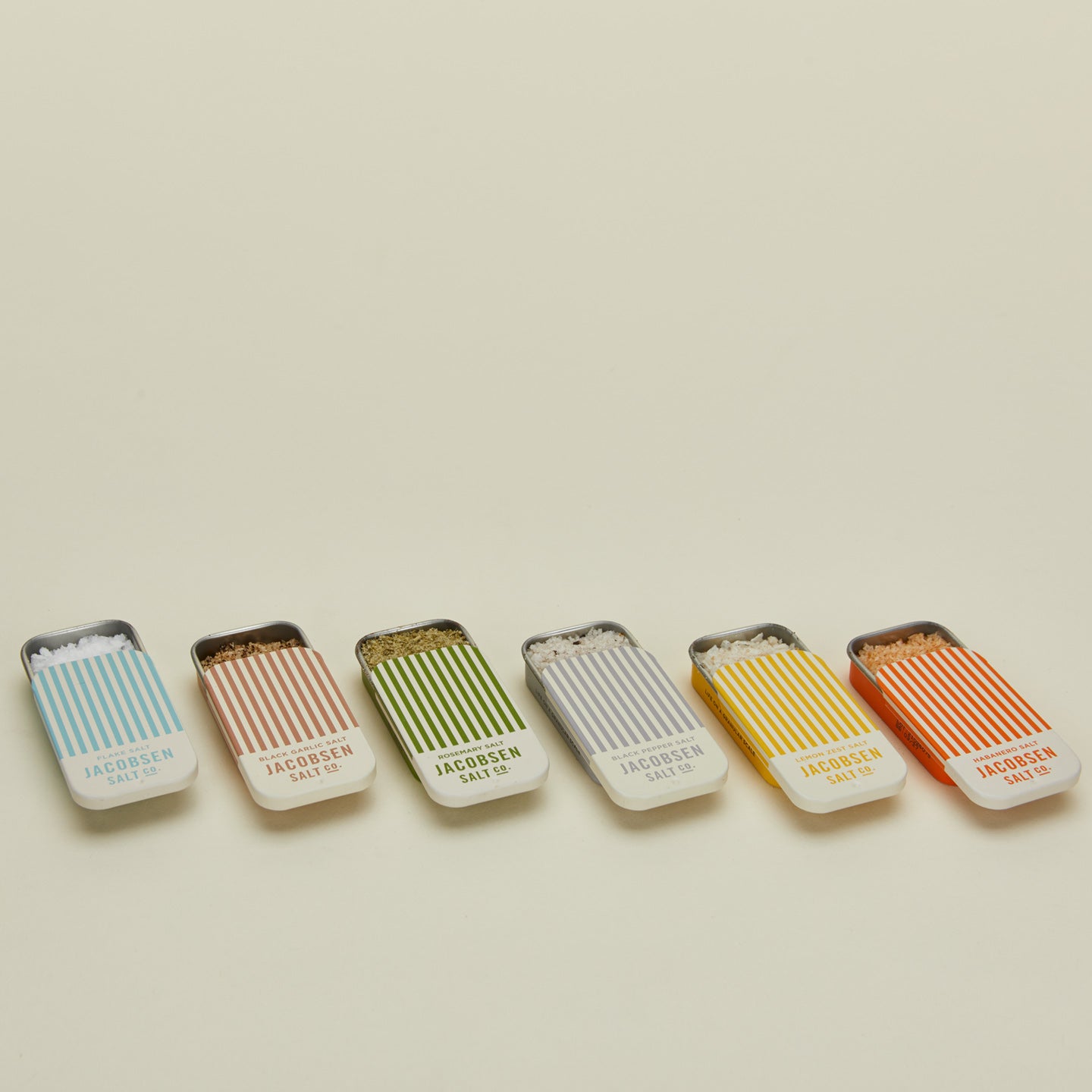 Infused Salt Tin Collection with lids open