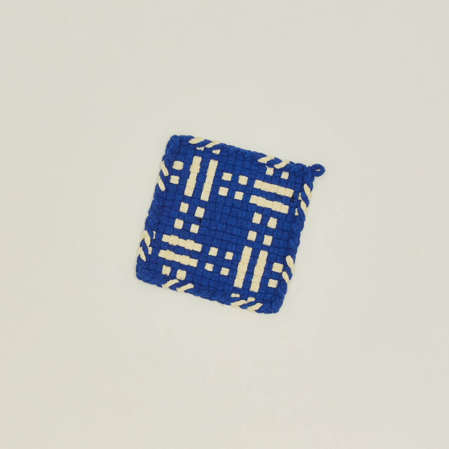 Dots and dashes potholder in blue and  yellow
