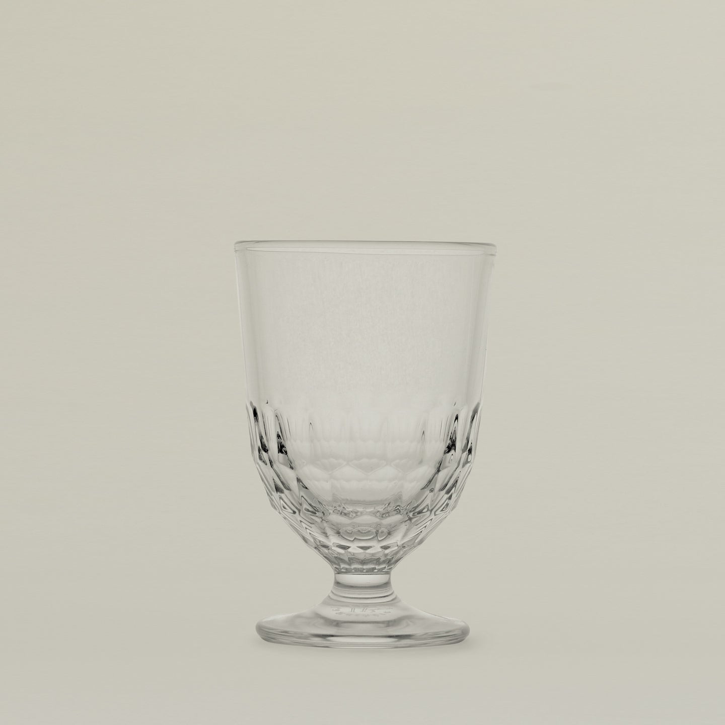 Close up of an Artois water glass.