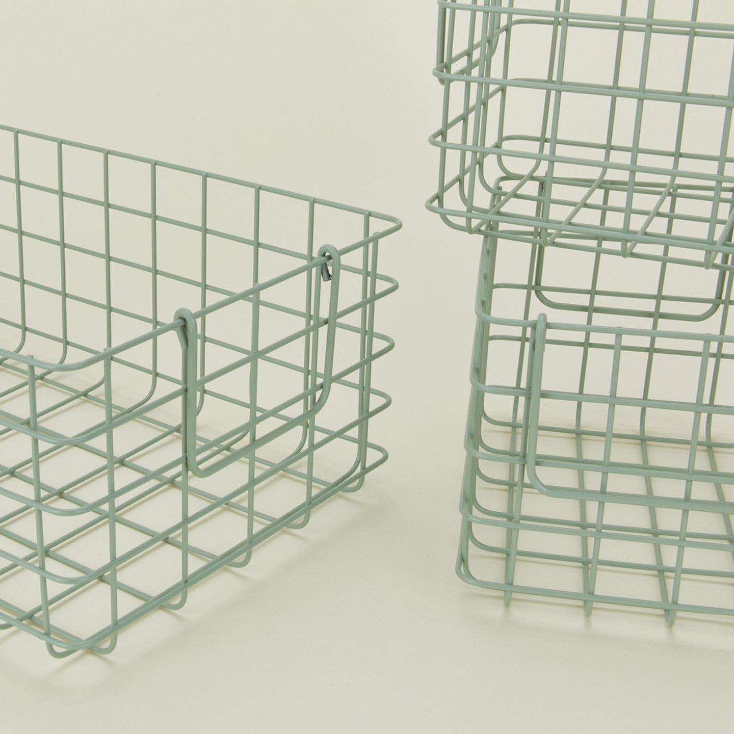 Close up view of Set of 3 grid baskets in sage