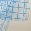 Close up view of atlantic sun grid shower curtain.