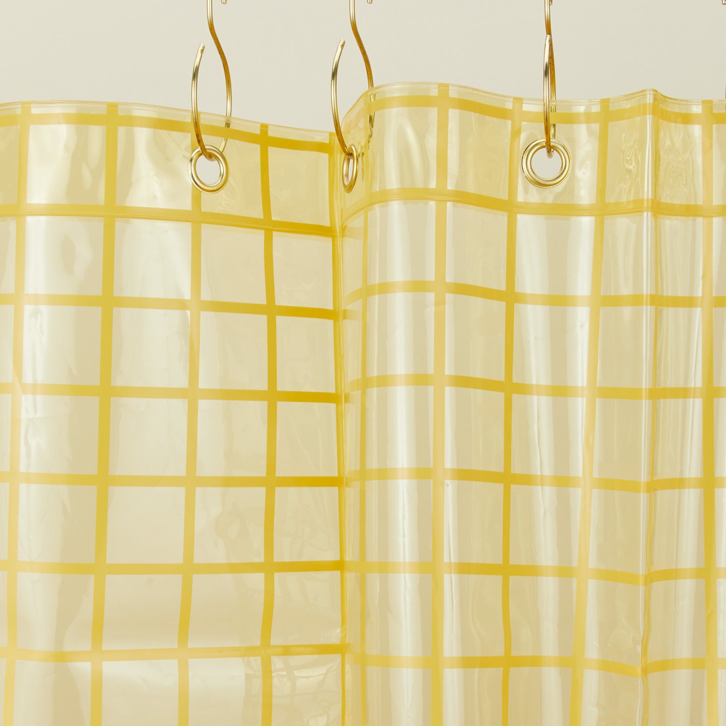 Sun grid shower curtain in butter