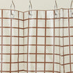Sun grid shower curtain in chocolate
