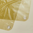 Close up view of sunny shower curtain in olive