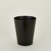 Wooden waste basket in dark