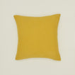 Simple linen pillow in mustard