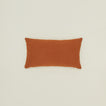Simple linen pillow in terracotta