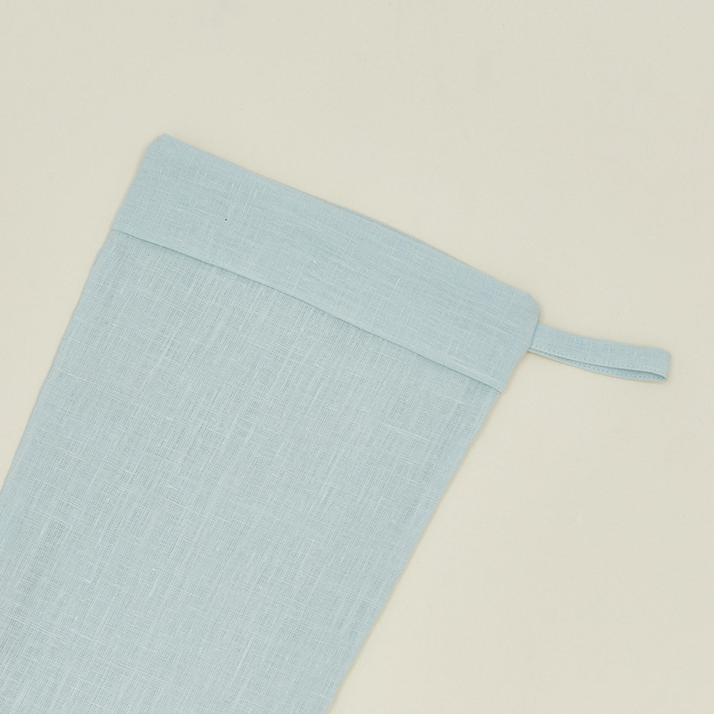 Detailed view of Simple linen stocking in sky