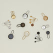 Simple measuring spoons and cups with ingredients in various finishes