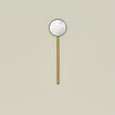 Simple metal flat slotted spoon in brass.
