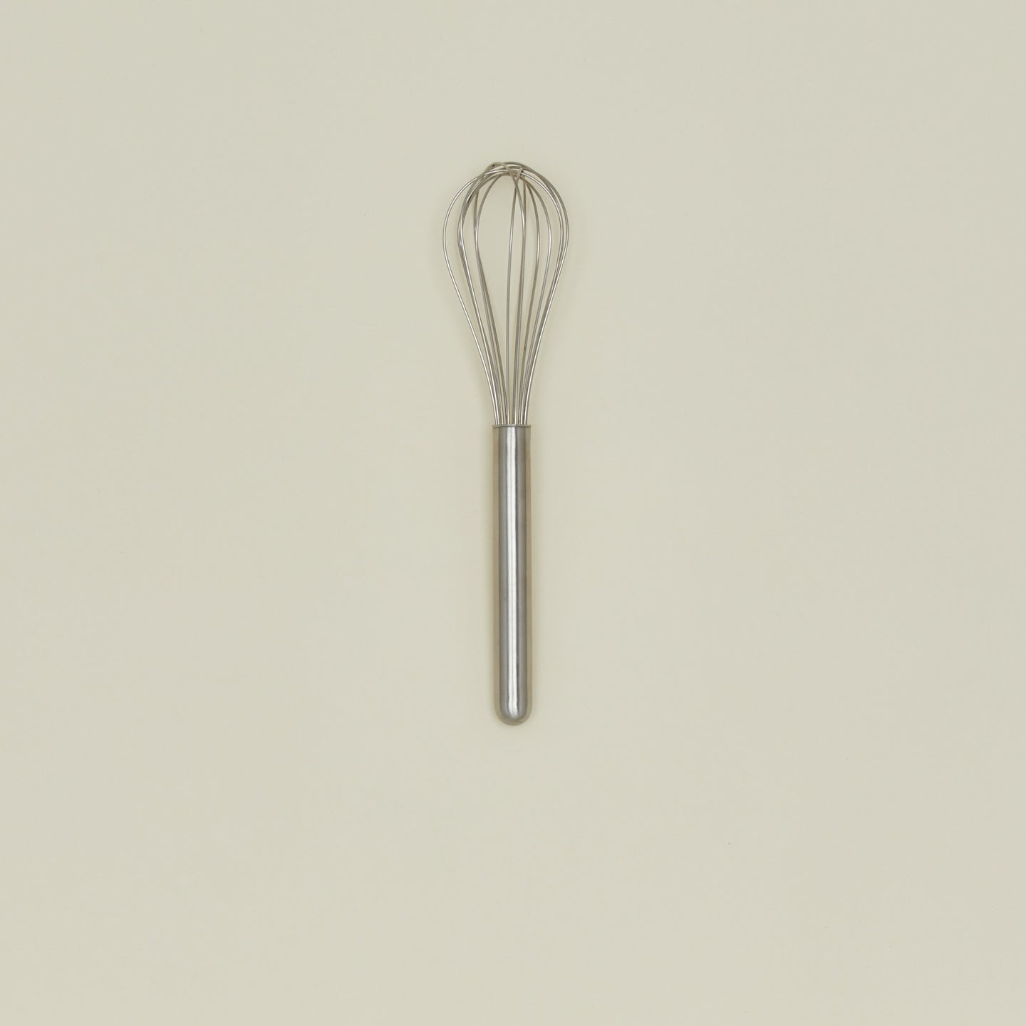 Simple metal whisk in silver