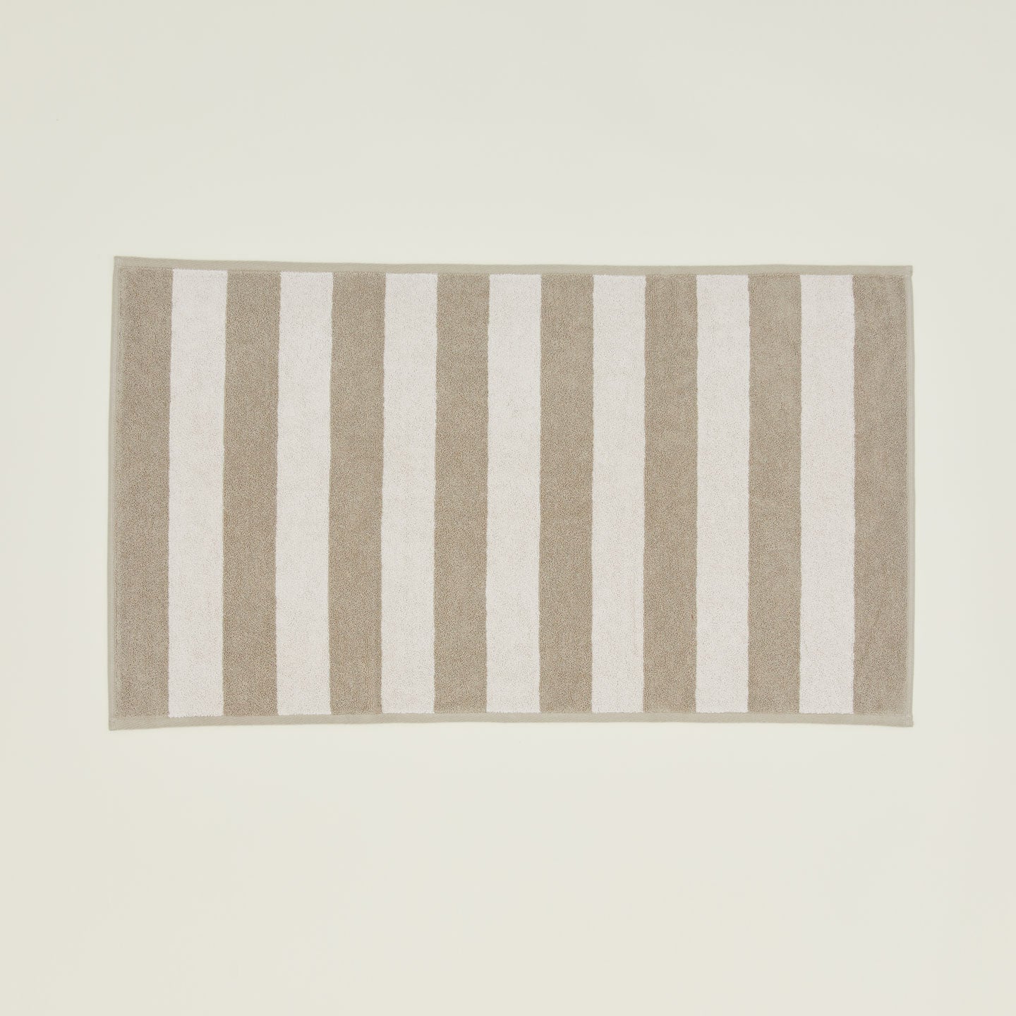 Simple Striped Terry Bath Mat in ivory and flax.