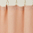 Simple waffle shower curtain in blush