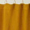 Simple waffle shower curtain in mustard