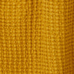 Close up view of simple waffle shower curtain in mustard