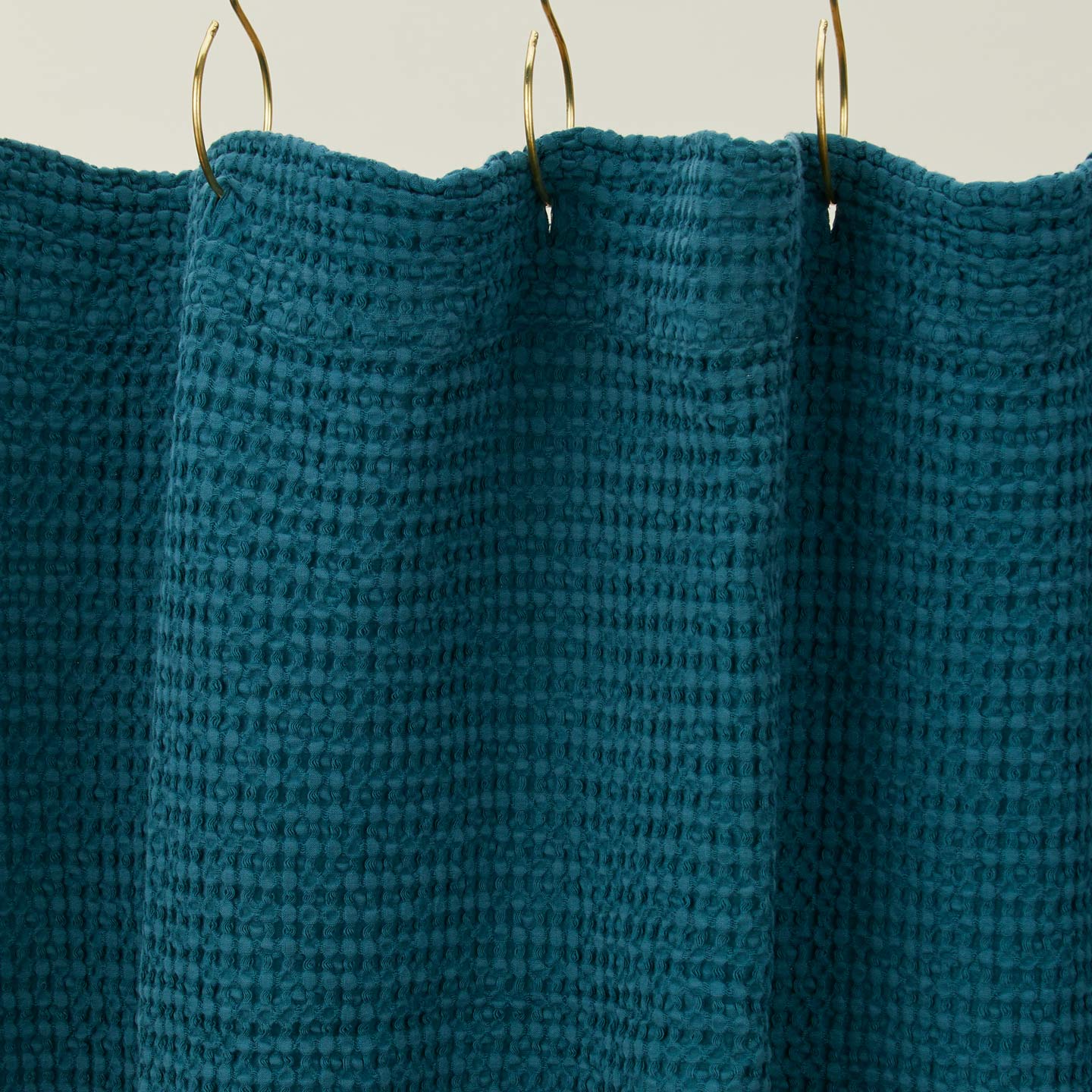 Simple waffle shower curtain in peacock