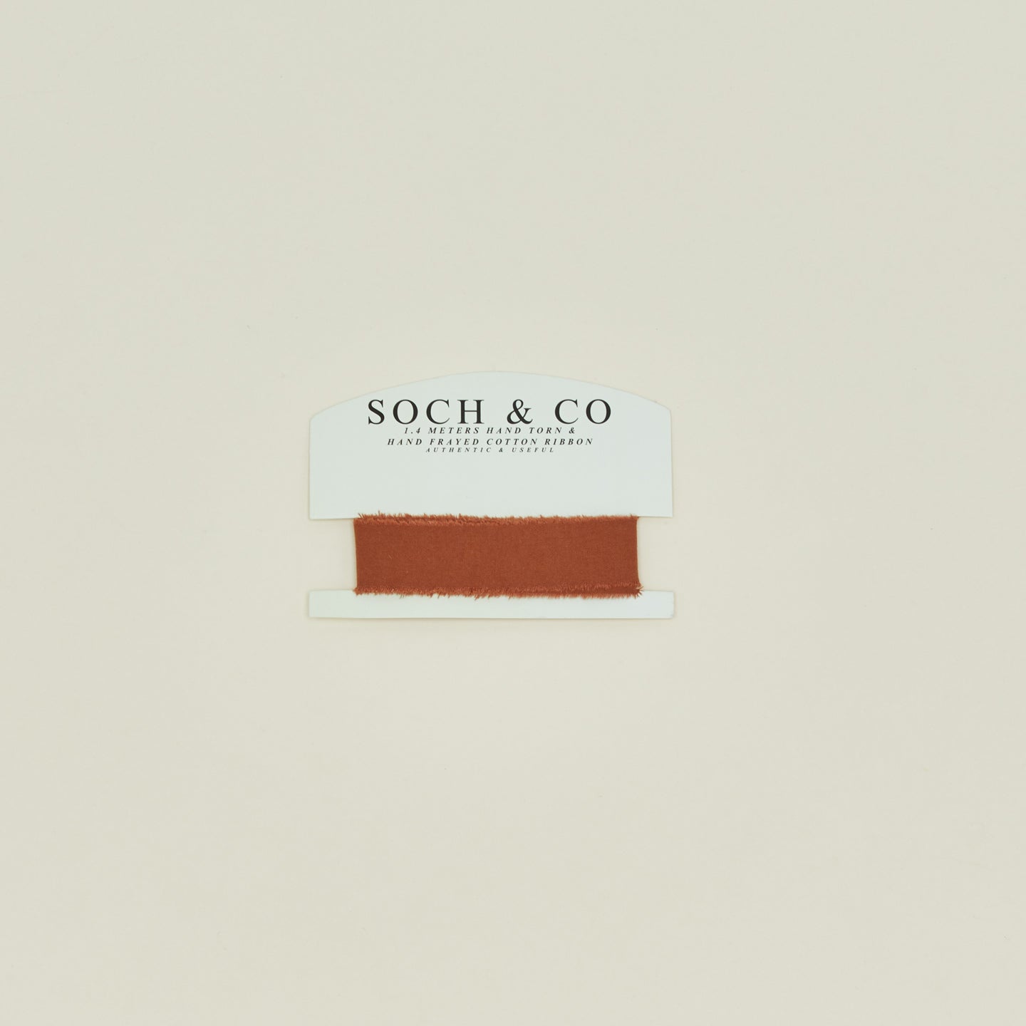 Soch & Co. frayed linen ribbon in cinnamon.