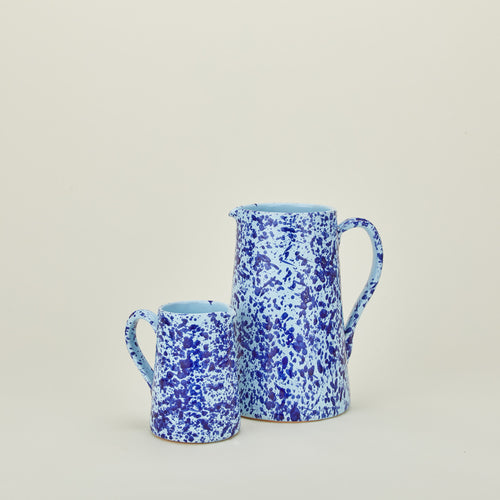 Large and small splatterware pitcher in sky and cobalt