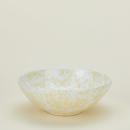 Splatterware serving bowl in white and ivory