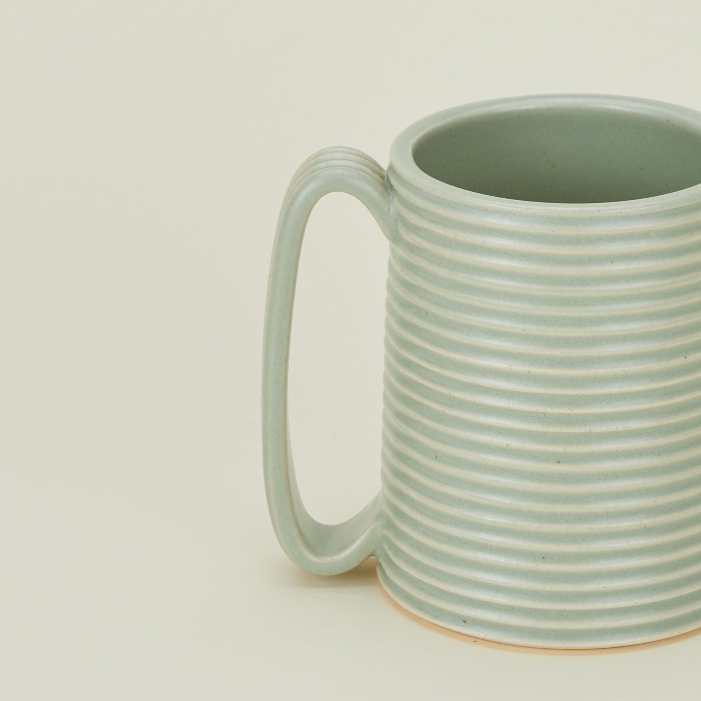 Close up of a Tall Ribbed Mug in Seafoam.