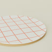 Close up view of Bamboo Melamine Dinner Plate in Red Grid