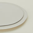 Close up of Atelier Dinner Plate and Atelier Dinner Plate stacked.